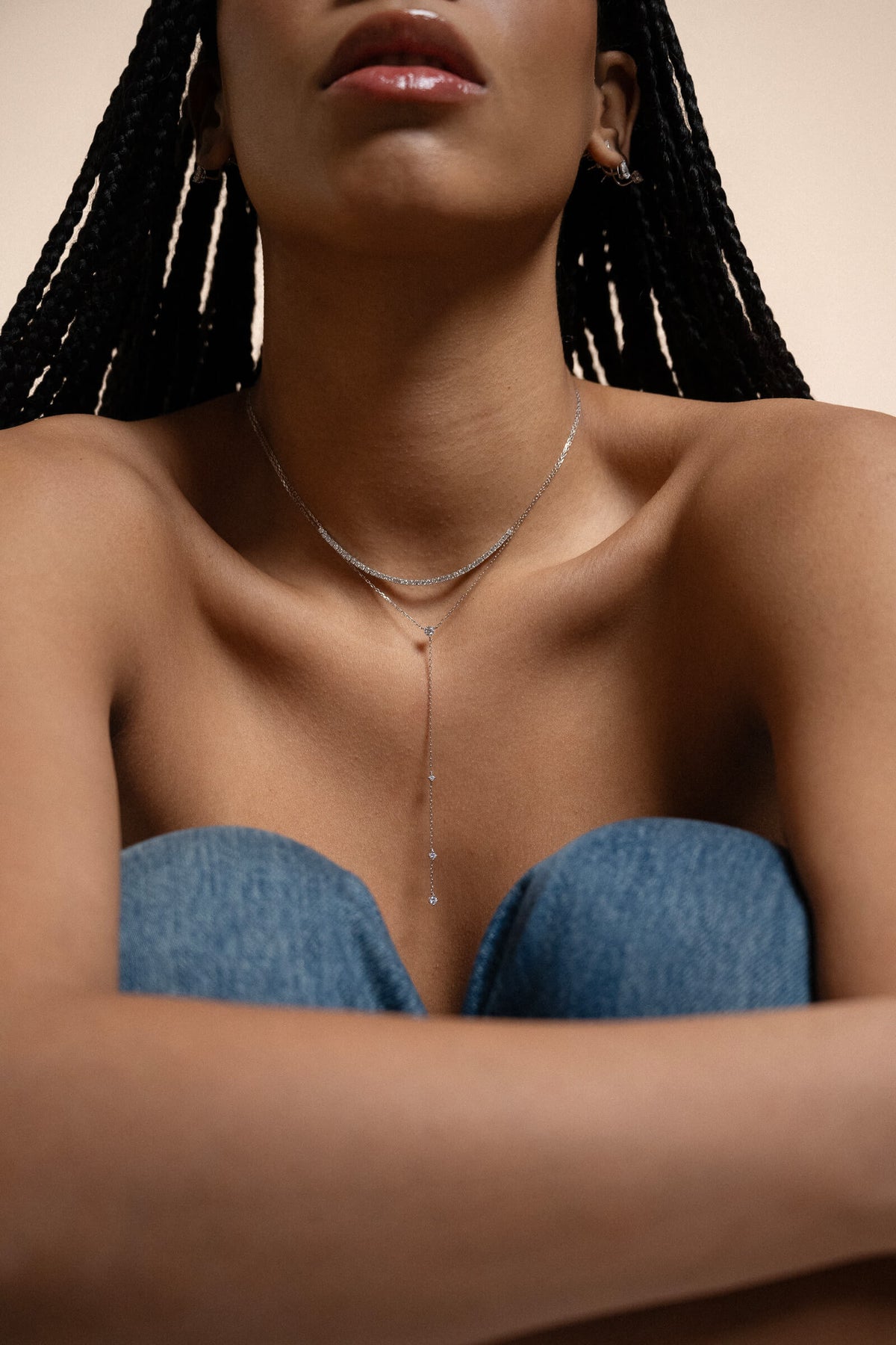 Anate Everyday Staples — model styling the Luna round diamond tie necklace in solid white gold with denim