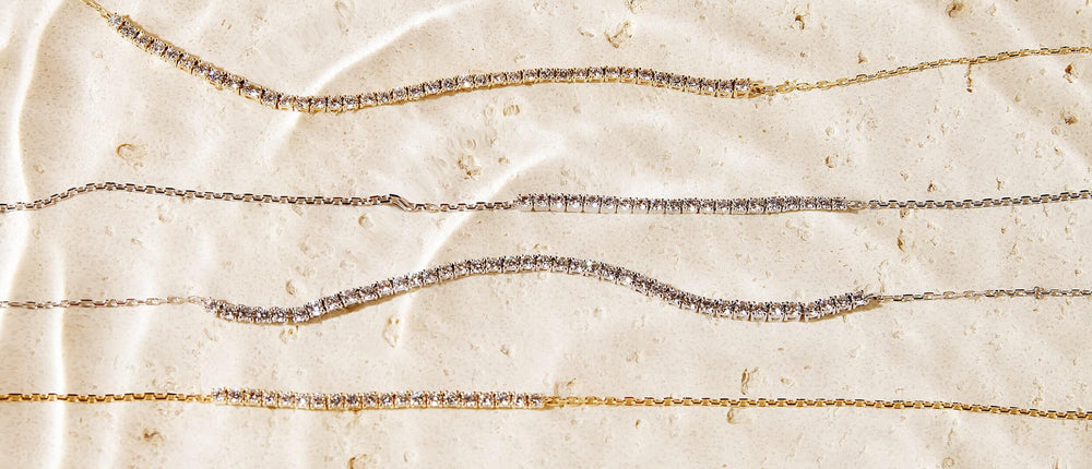 Anaté diamond bracelets in flowing waves on natural stone — Anaté means shine, every woman carries her own light
