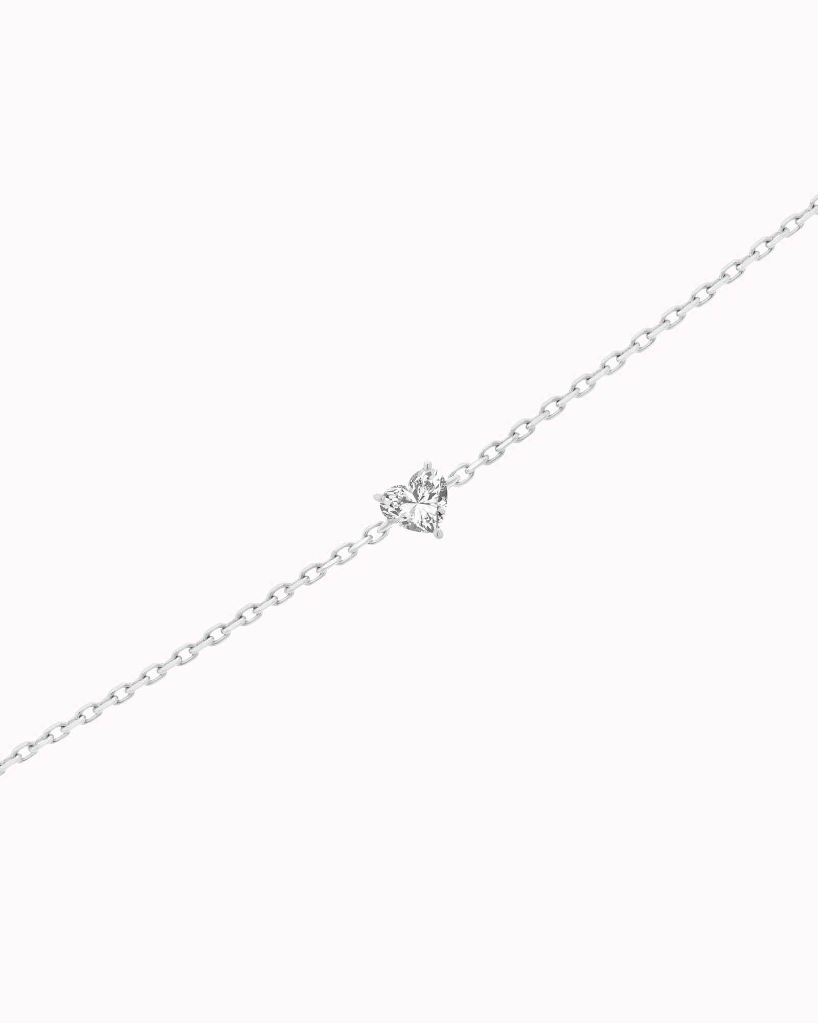 Mara heart diamond bracelet in solid white gold by Anate, three-quarter angle view