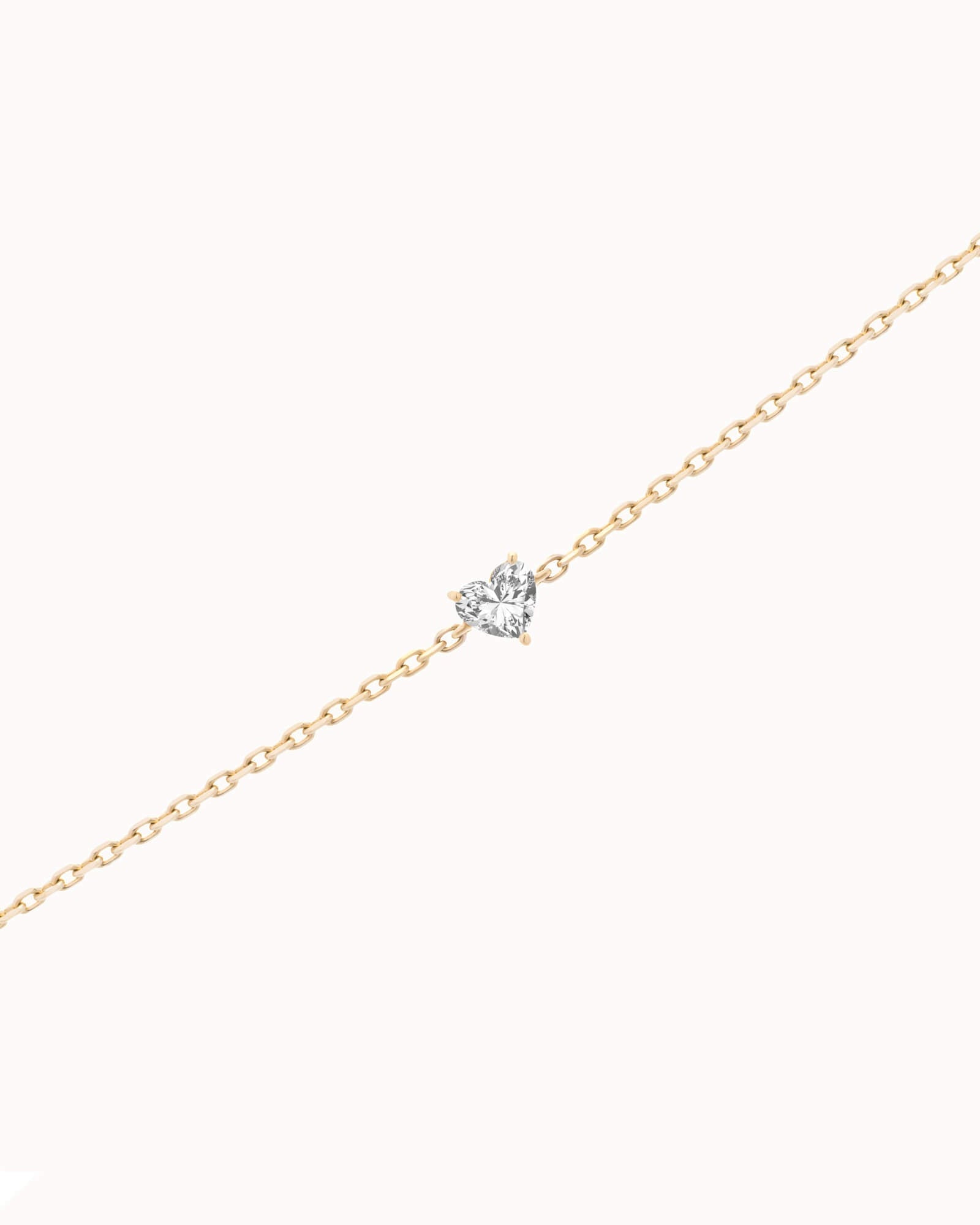 Mara heart diamond bracelet in solid yellow gold by Anate, three-quarter angle view