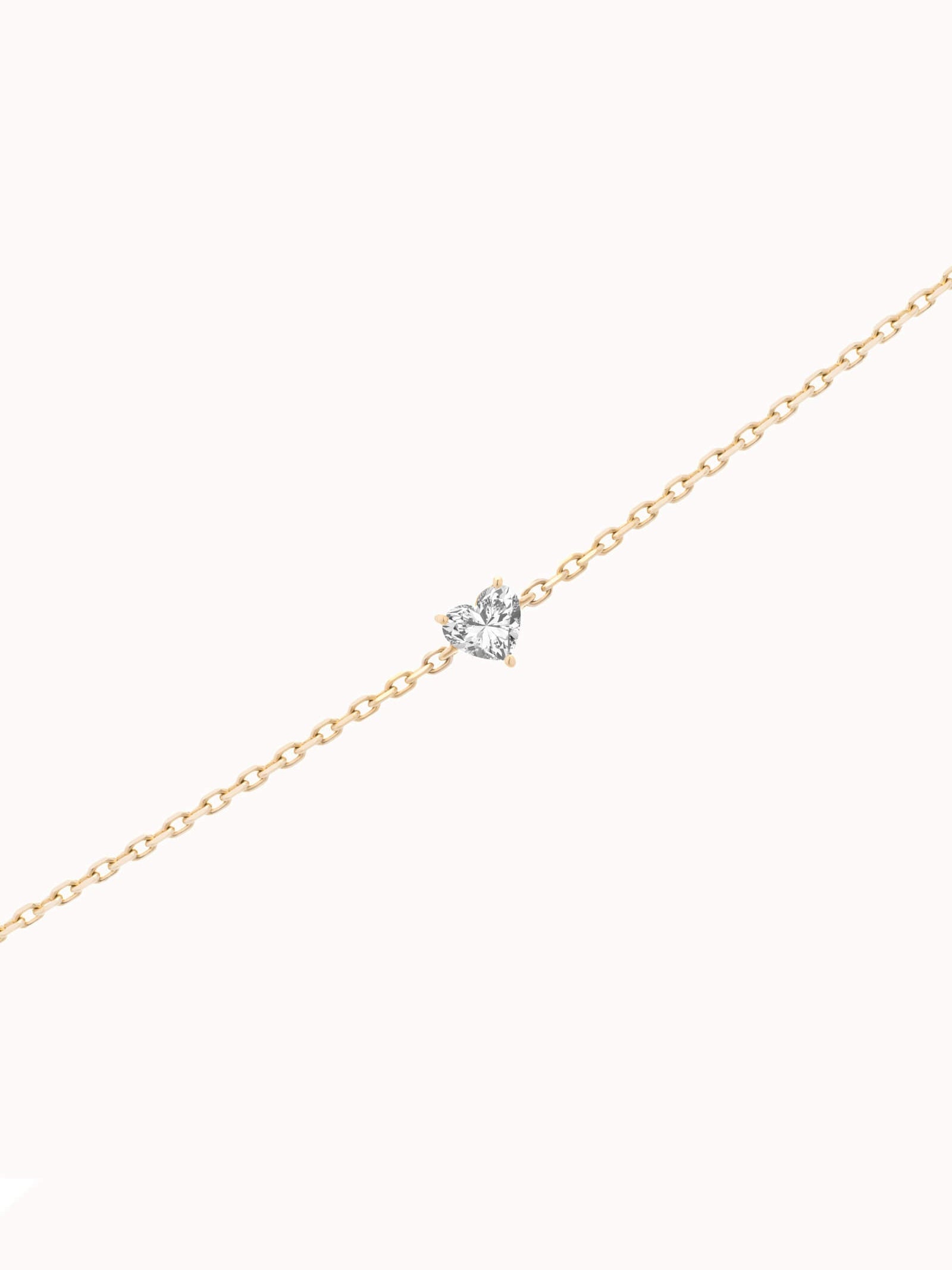 Mara heart diamond bracelet in solid yellow gold by Anate, three-quarter angle view