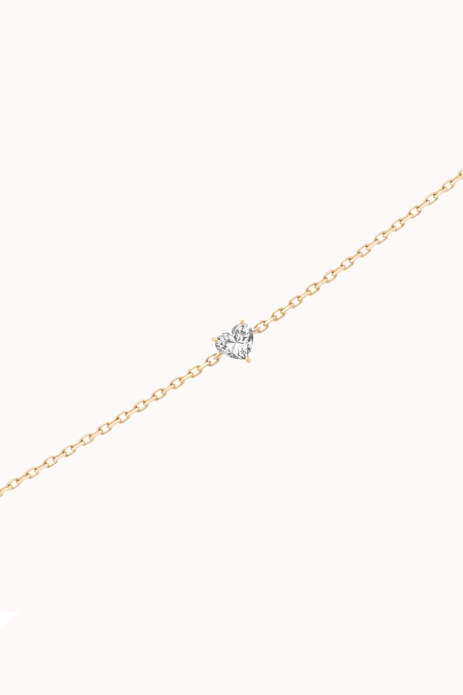 Mara heart diamond bracelet in solid yellow gold by Anate, three-quarter angle view