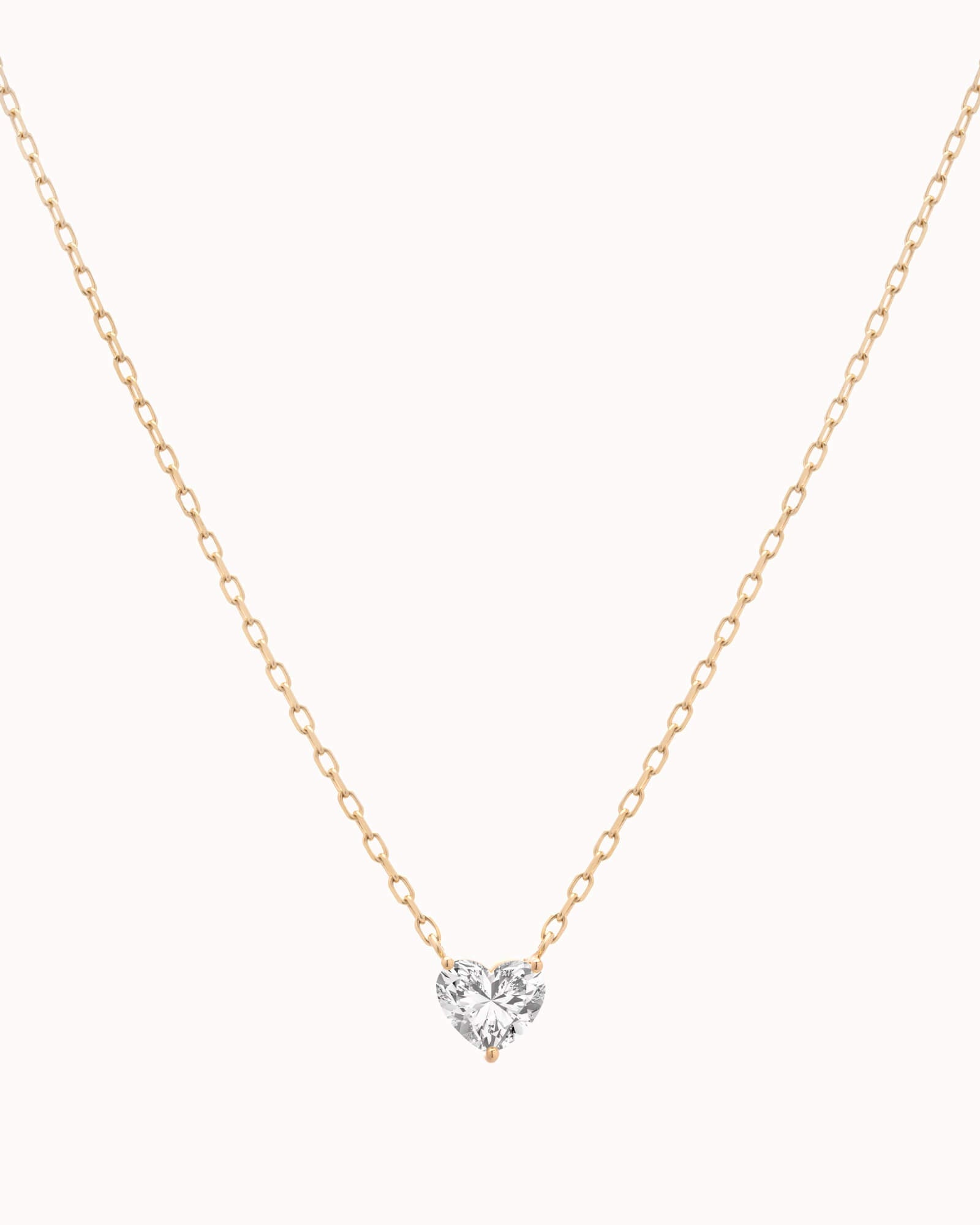 Lumi heart diamond pendant in solid yellow gold by Anate, front view