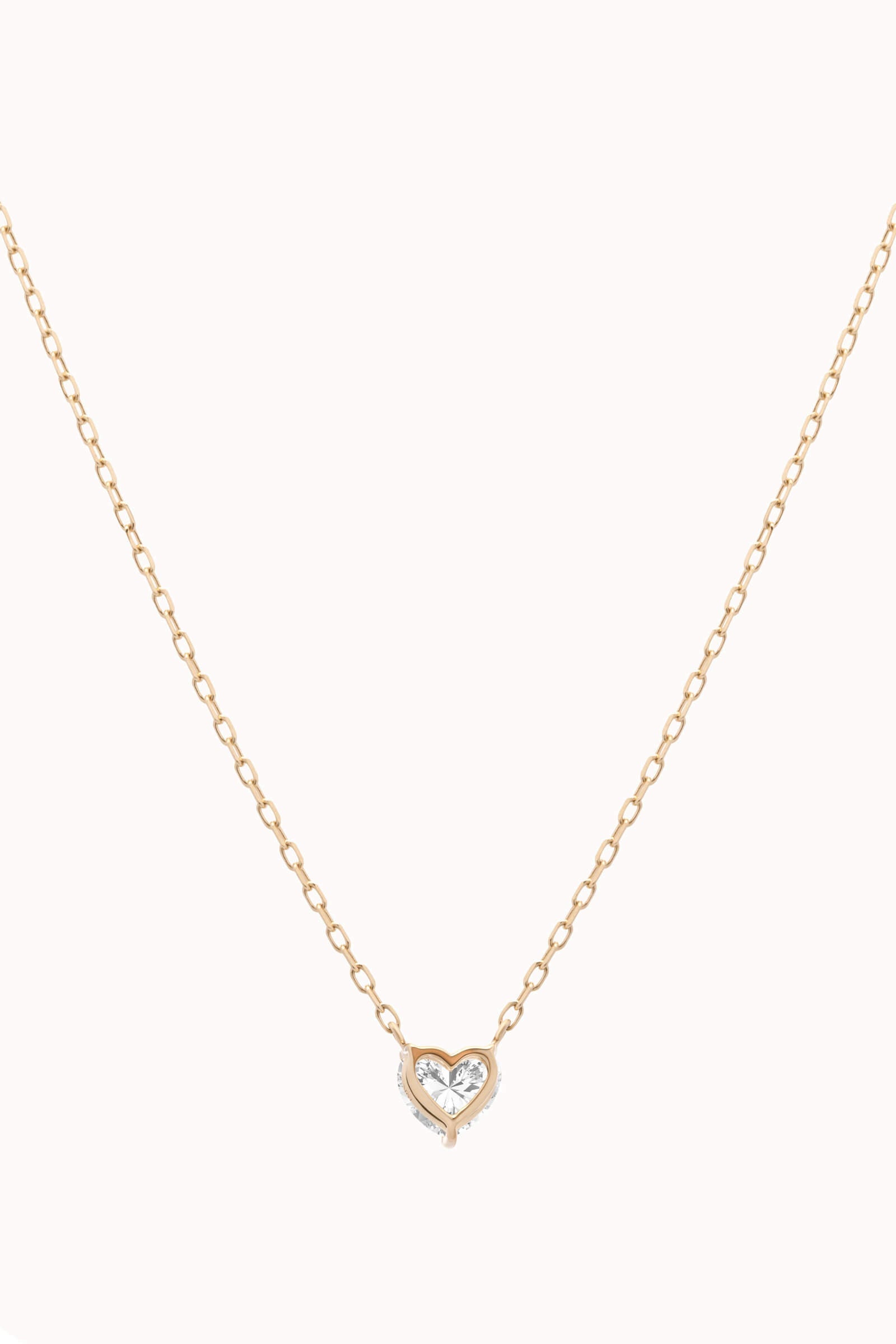 Lumi heart diamond pendant in solid yellow gold by Anate, front view