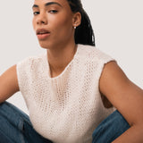 Model wearing the Elin oval diamond ear jacket earrings in solid white gold by Anate, worn on model, portrait shot variant--0.50ct
