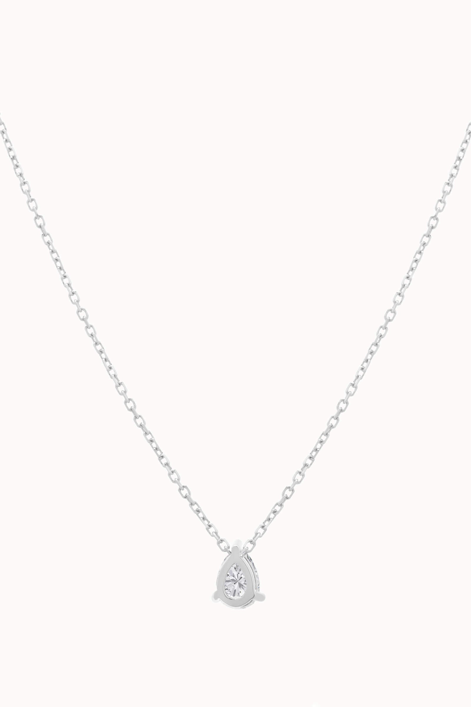 Liora pear diamond pendant in solid white gold by Anate, front view