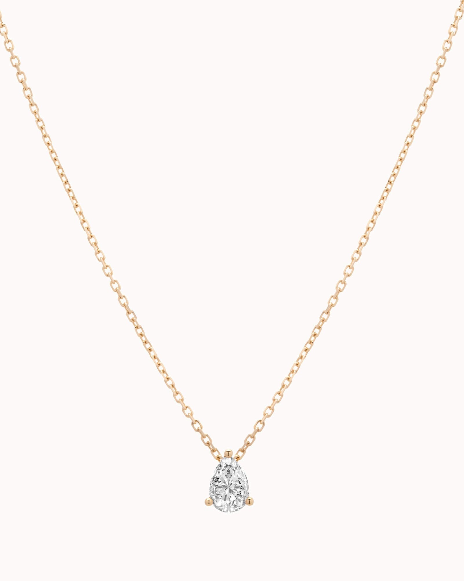Liora pear diamond pendant in solid yellow gold by Anate, front view