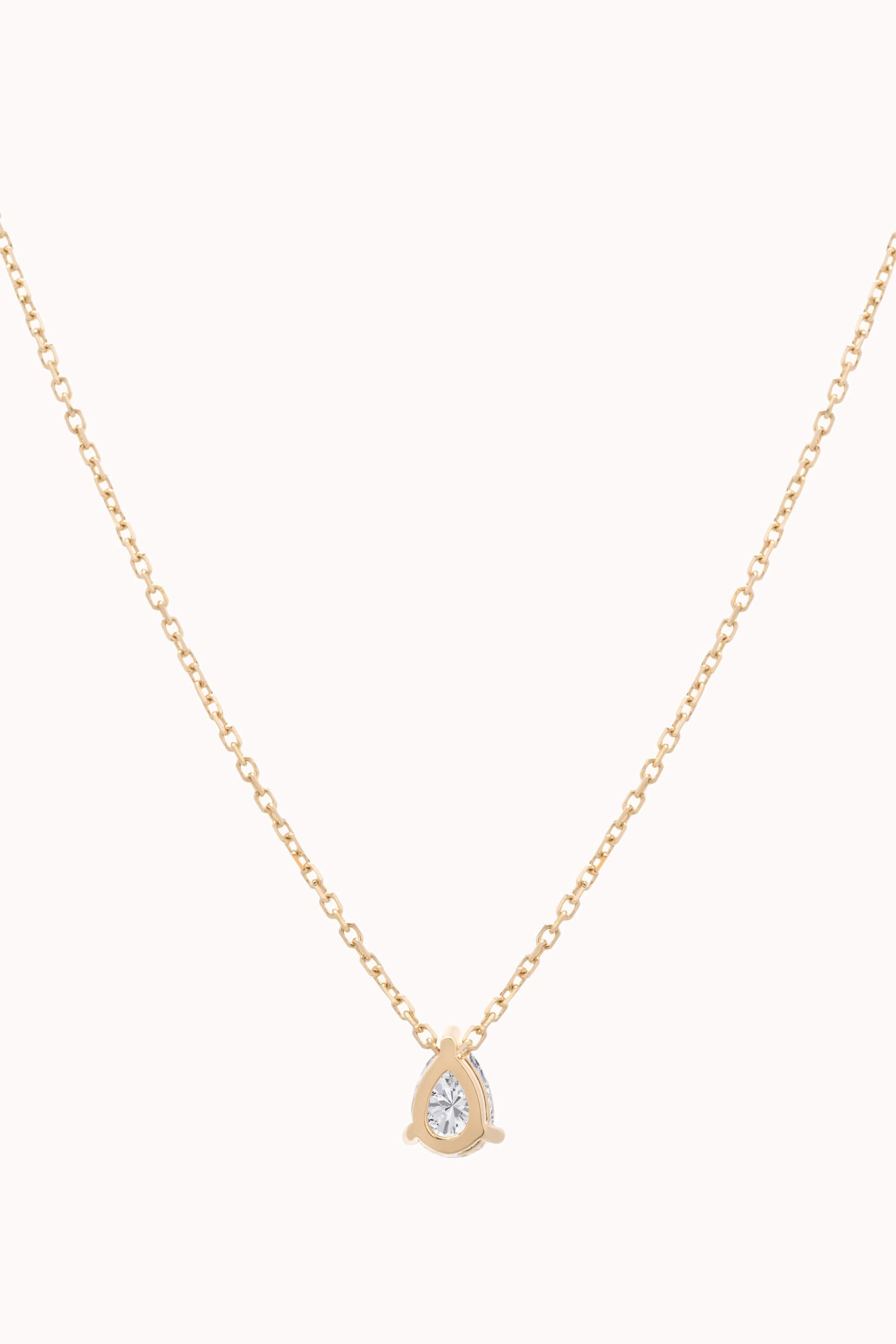 Liora pear diamond pendant in solid yellow gold by Anate, front view