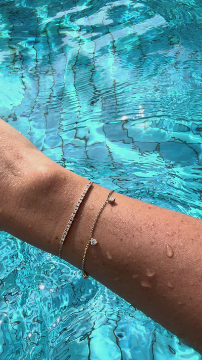 Smile bracelet yellow gold and 3 diamond bracelet by the pool