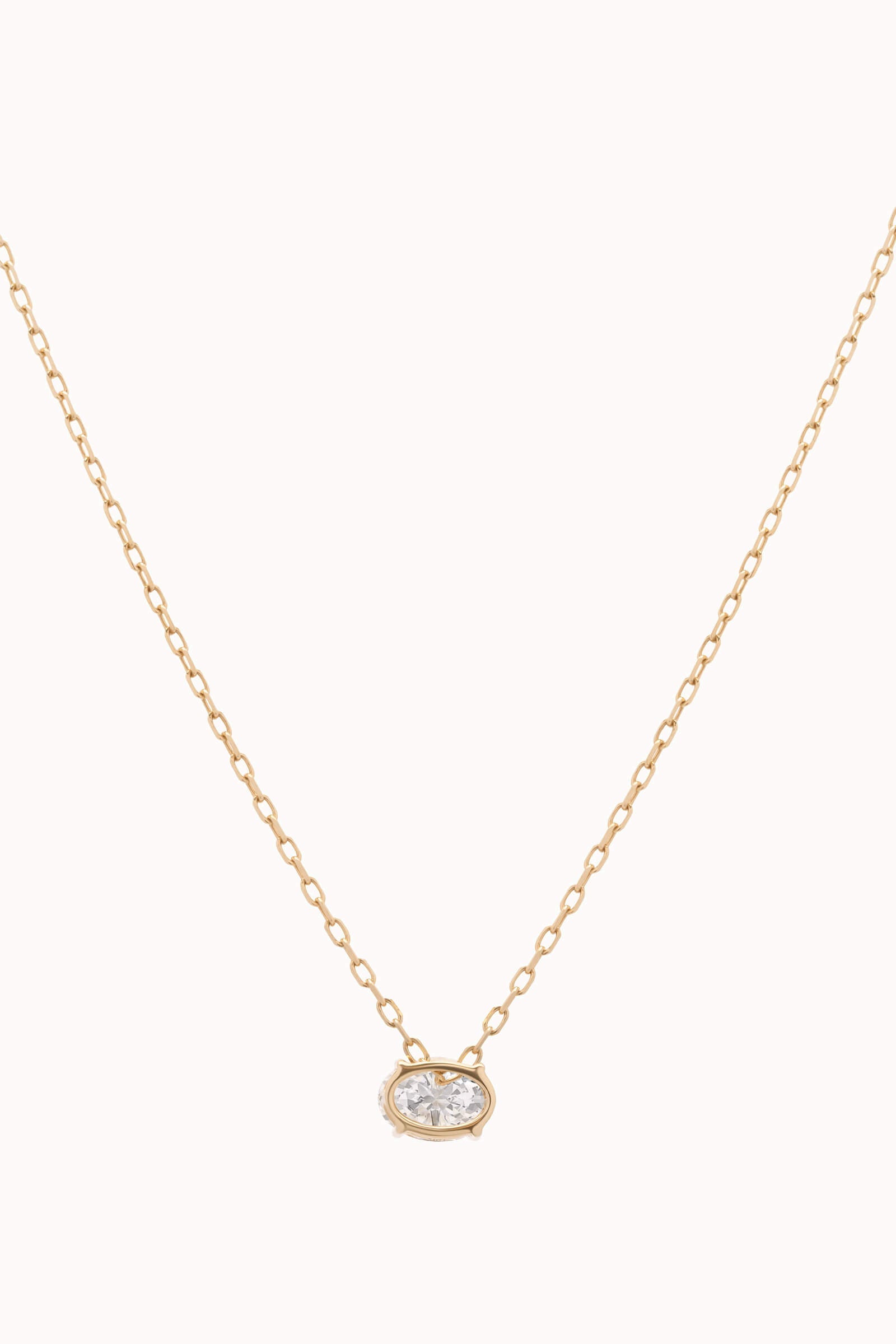 Elara reversible oval diamond pendant in solid yellow gold by Anate, front view