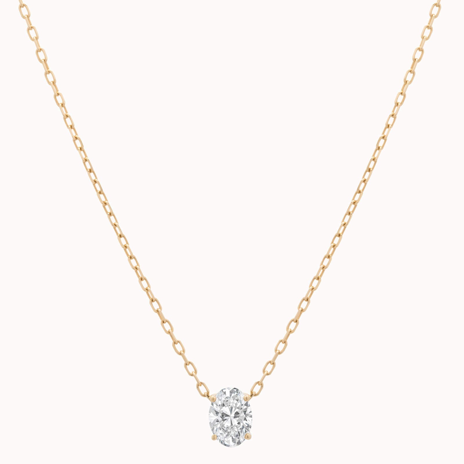 Elara reversible oval diamond pendant in solid yellow gold by Anate, front view