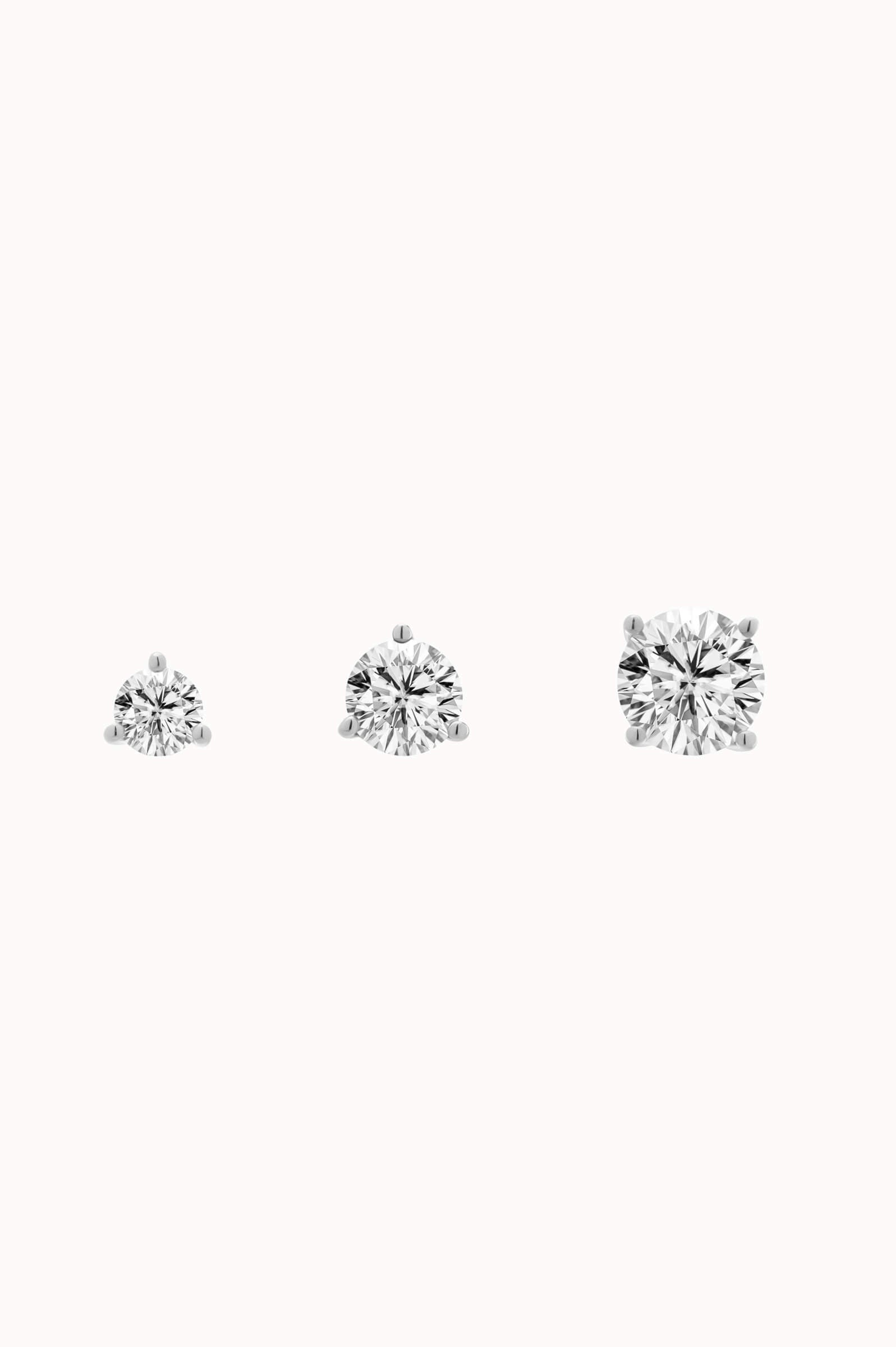 Astra round diamond stud earrings in solid white gold by Anate, size comparison shot