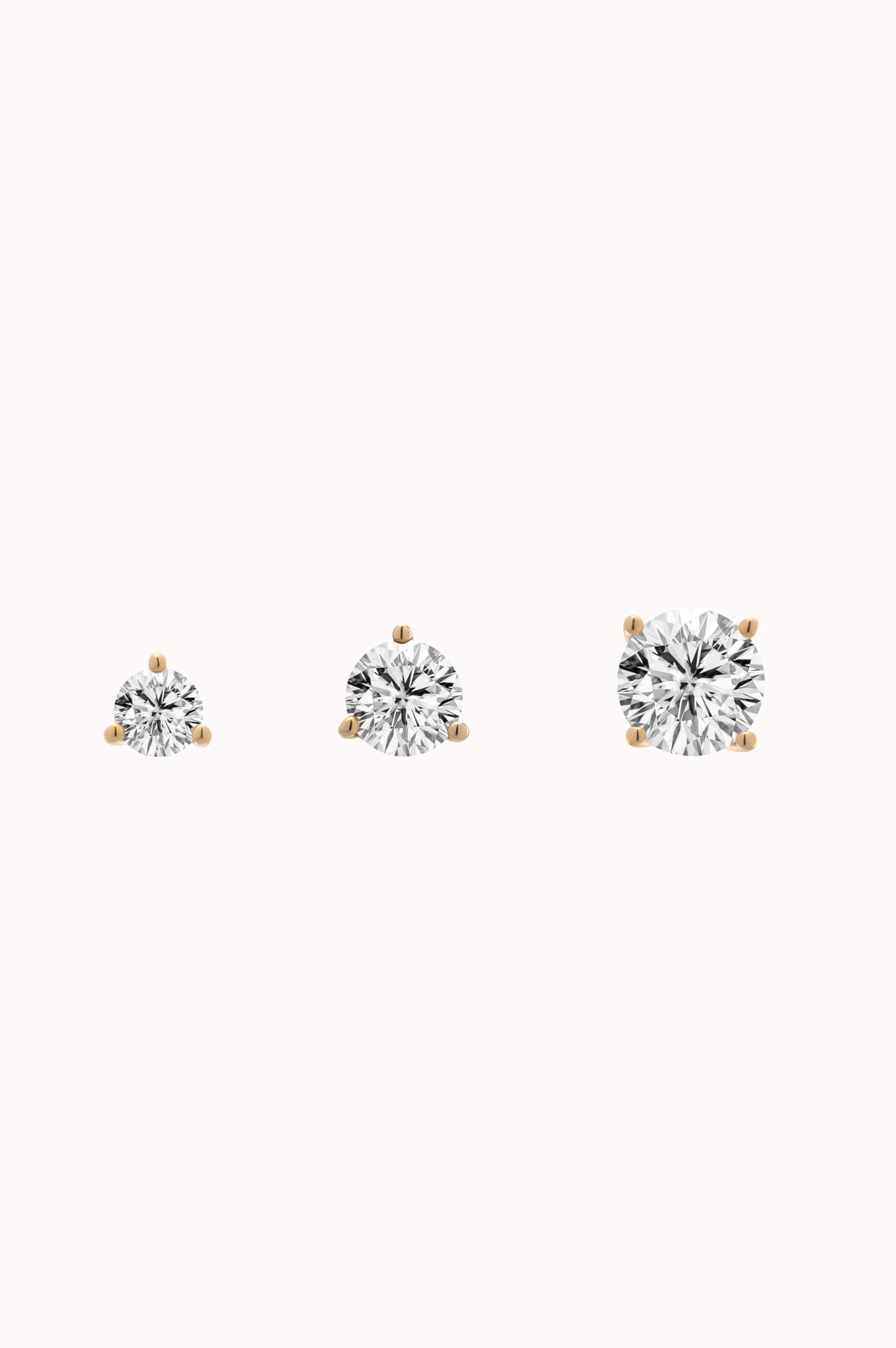 Astra round diamond stud earrings in solid yellow gold by Anate, size comparison shot