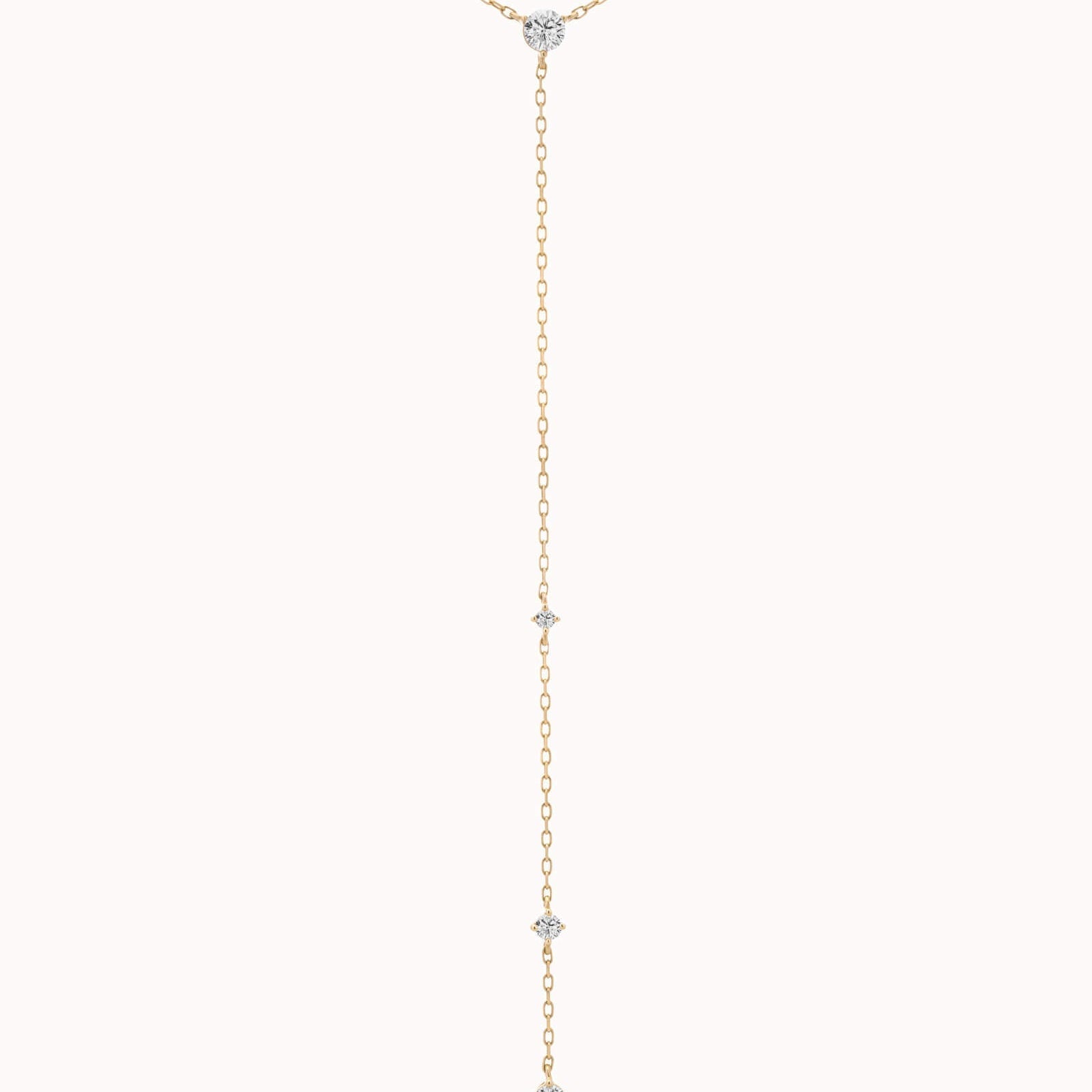 Luna round diamond tie necklace in solid yellow gold by Anate, close-up of the pendant
