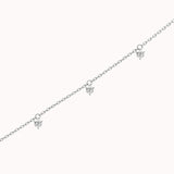 Tria three diamond bracelet in solid white gold by Anate, three-quarter angle view