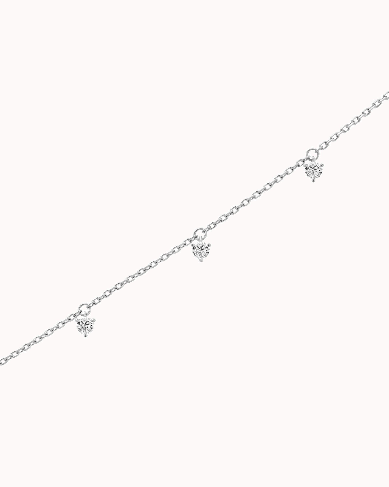 Tria three diamond bracelet in solid white gold by Anate, three-quarter angle view