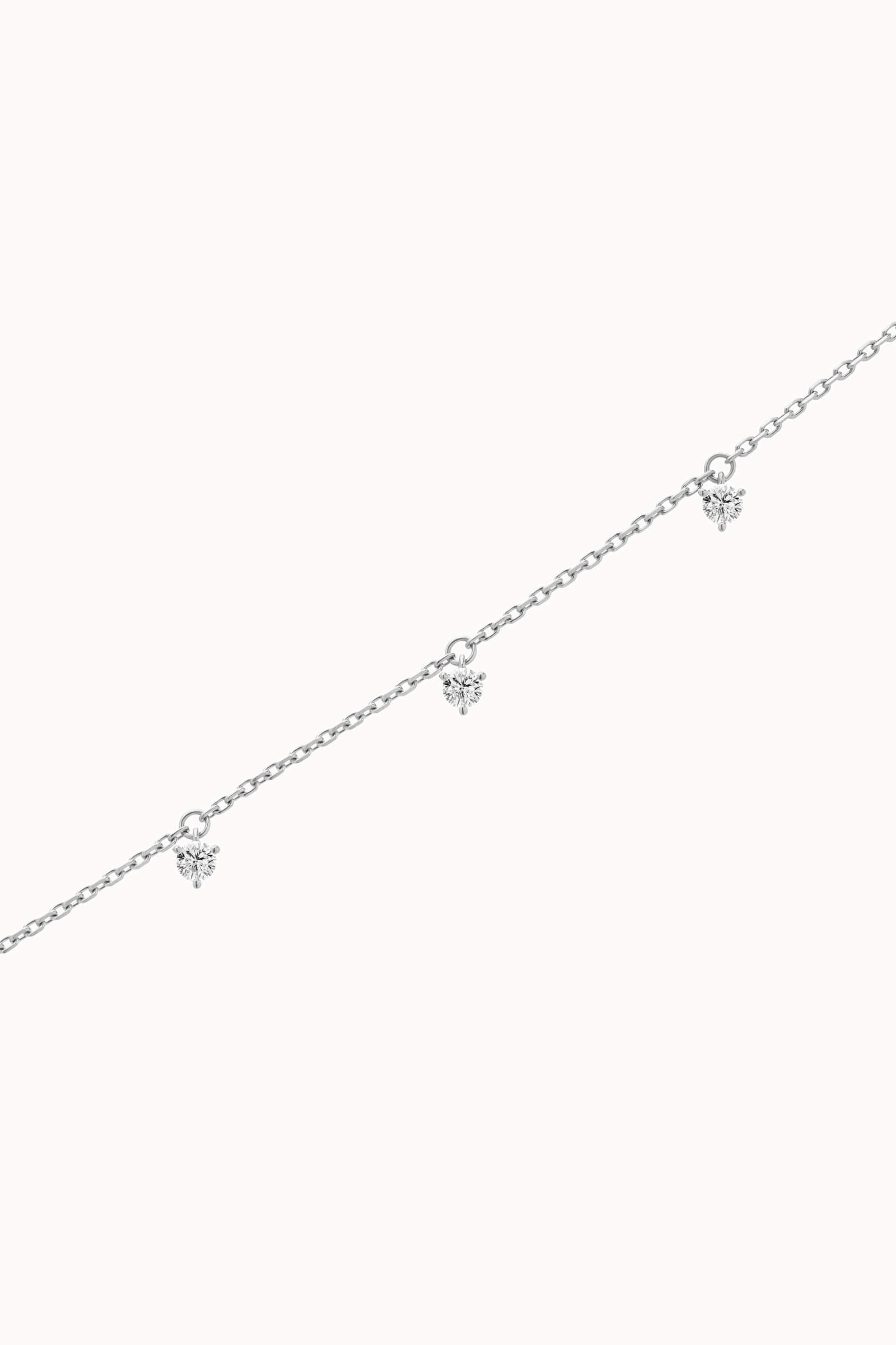 Tria three diamond bracelet in solid white gold by Anate, three-quarter angle view
