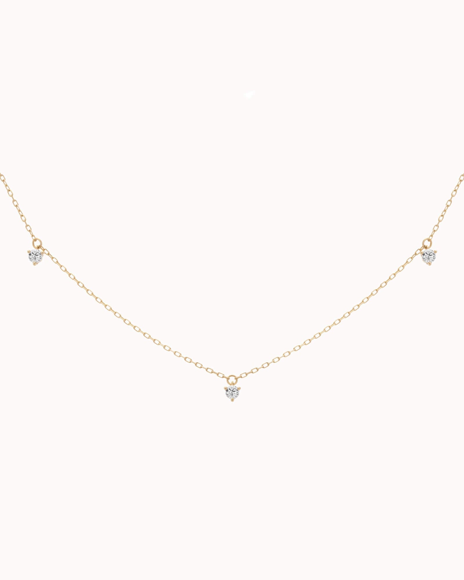 Elio three diamond necklace in solid yellow gold by Anate, front view