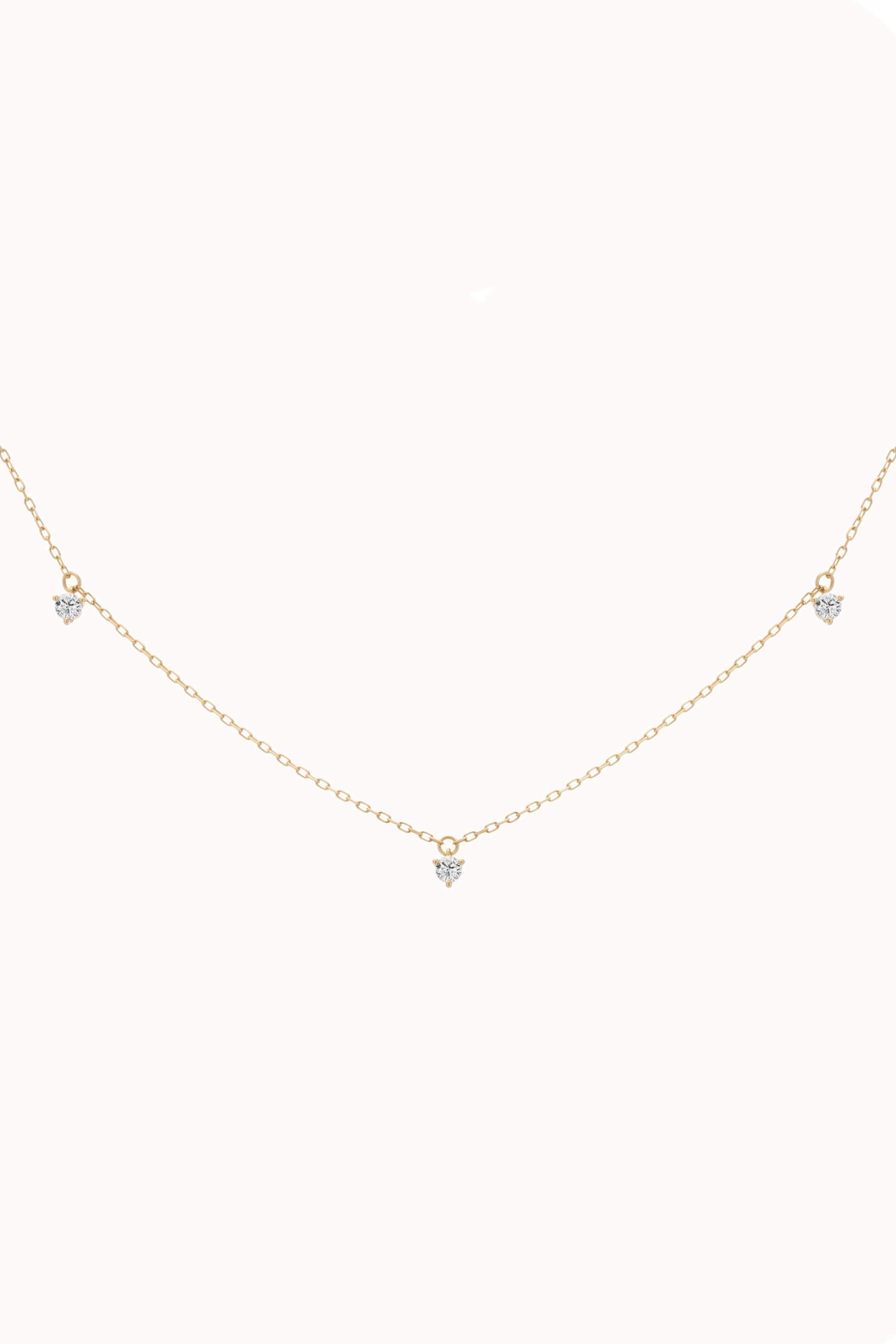 Elio three diamond necklace in solid yellow gold by Anate, front view